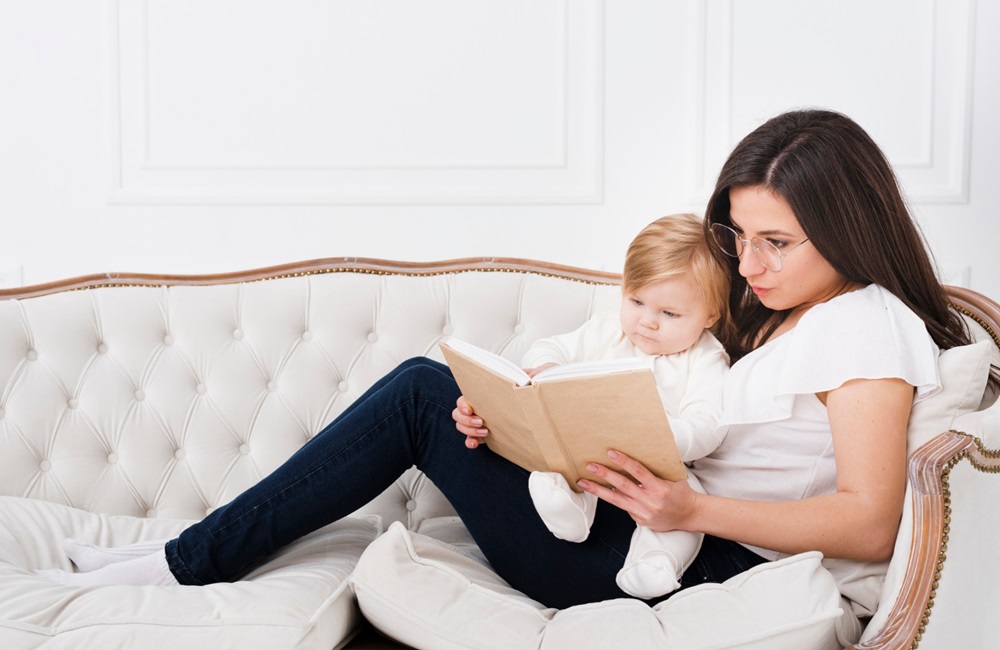 mother-reading-on-sofa-with-baby.jpg