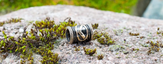 Серебряная руна kennaz.