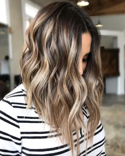 6-glossy-wavy-lob-with-light-brown-highlights.jpeg