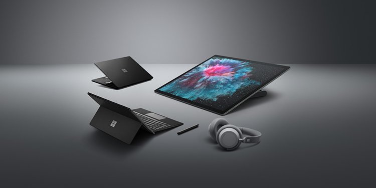 microsoft-surface-pro-6-surface-laptop-2-surface-studio-2-surface-headphones-hands