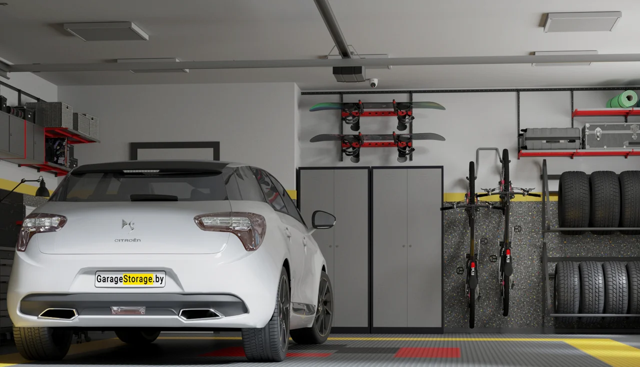 Белый автомобиль в гараже с настенной системой хранения IF для велосипедов, сноубордов и автомобильных шин