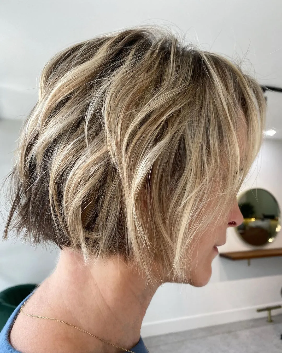 32-jaw-length-shaggy-blonde-balayage-bob.webp