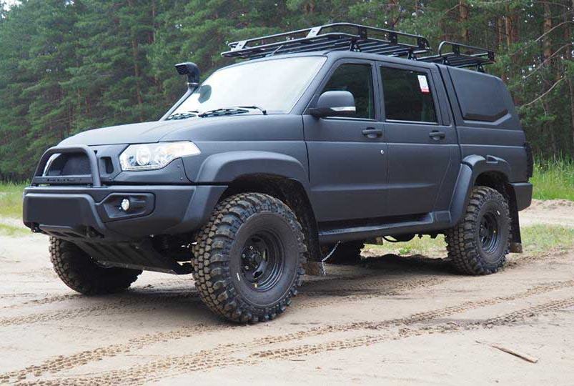 Лифтованный УАЗ Патриот Пакап в обвесе АВС-Дизайн, покраска Раптор.