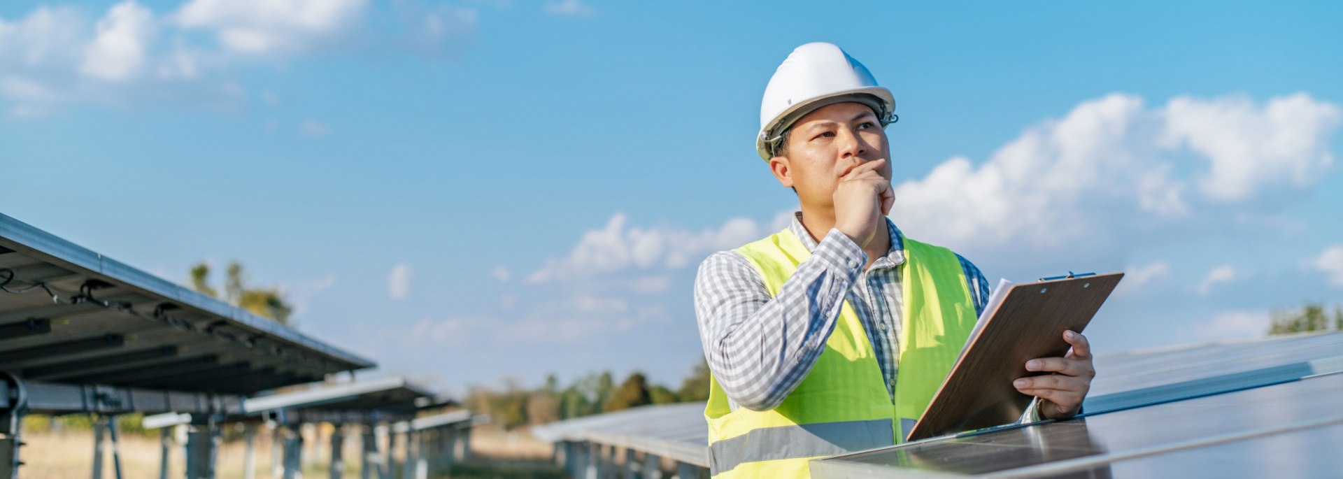young-asian-inspector-engineer-man-working-at-solar-farm-technician-or-supervisor-male-in-white-helmet-checking-operation-of-sun-and-photovoltaic-solar-panel-in-station-copy-space (2).jpg