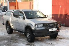 Установка силового обвеса OJ на автомобиль Mitsubishi L200