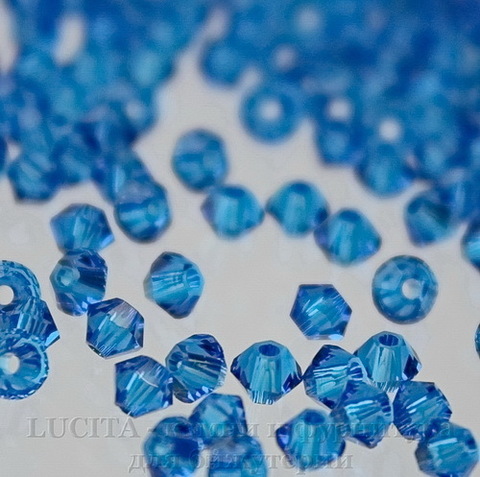 5328 Бусина - биконус Сваровски Capri Blue 3 мм, 10 штук