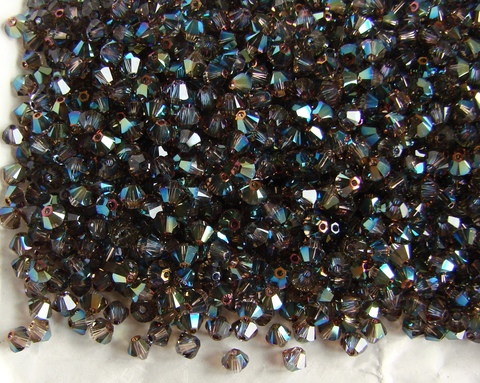 Биконусы 4мм Сваровски Iridescent Green