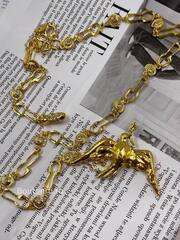 Пояс Скиап. золотистый с Птицей и звеньями в форме замочных скважин 85 см