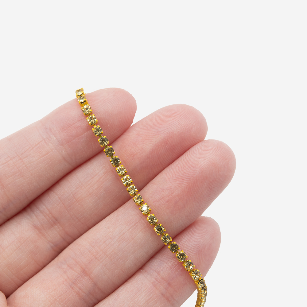 Стразовая цепь, 2мм, желтый кристалл в желтых цапах