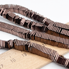 Гематит Квадрат бусины (имитация), цвет коричневый, размер около 1*6 мм, цена за отрезок 9-9,5 см (1/4 нити)