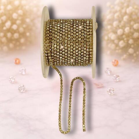 Цепь со стразами в бобине (2 мм) , серебро в золотой оправе