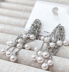 Серьги длинные с цепочками с жемчужинами