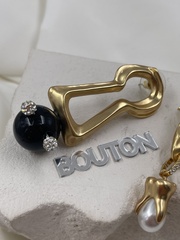 Серьги Скиап. золотистые в виде замочной скважины и уха