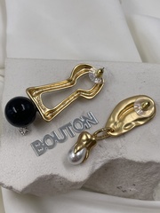 Серьги Скиап. золотистые в виде замочной скважины и уха