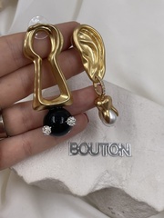 Серьги Скиап. золотистые в виде замочной скважины и уха