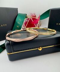 braslet-kruchenyj-zhyostkij-iz-serebra-925-proby-s-fianitami