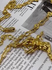 Пояс Скиап. золотистый с Птицей и звеньями в форме замочных скважин 85 см