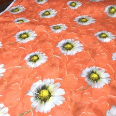Ткань хлопок фил-купе ромашки в оранжевом цвете 2002