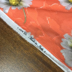 Ткань хлопок фил-купе ромашки в оранжевом цвете 2002