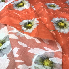 Ткань хлопок фил-купе ромашки в оранжевом цвете 2002