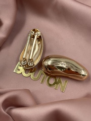 Пряжка-брошь неровной формы для купальника золотистая