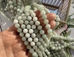 Нить бусин из тонированного кварца 8мм, гладкие