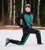 Премиальные брюки для лыж и зимнего бега Nordski Hybrid Warm Black-Alpine Green мужские