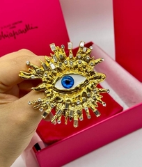 brosh-glaz-s-luchami-s-kristallami-v-stile-schiaparelli