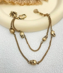 5321-braslet-lux-iz-latuni-i-podveskami-cherepami-v-stile-alexander-mcqueen