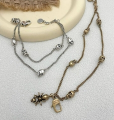 5321-braslet-lux-iz-latuni-i-podveskami-cherepami-v-stile-alexander-mcqueen