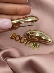 Пряжка-брошь неровной формы для купальника золотистая