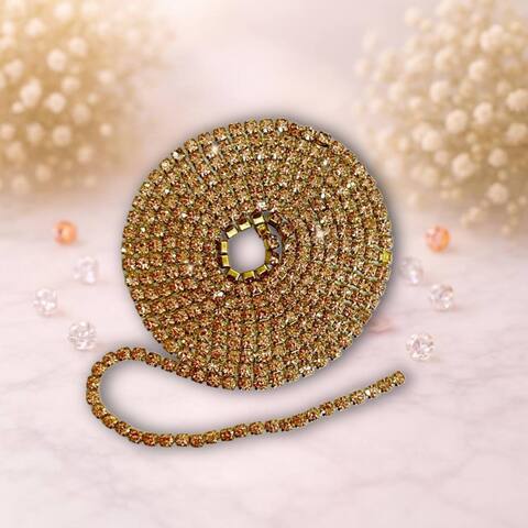 Стразовая лента 2,5мм цвет золото-св. розовый (упаковка 1м)