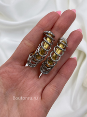 Серьги кольца массивные золотистые с серебристыми колечками 