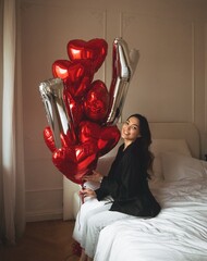 Связка гелиевых сердец и буквы IY