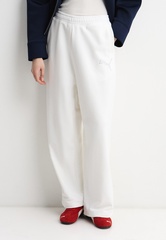 Брюки спортивные женские PUMA ESS GRAPHIC LEO LUXE Bedazzled Slouchy Pants TR