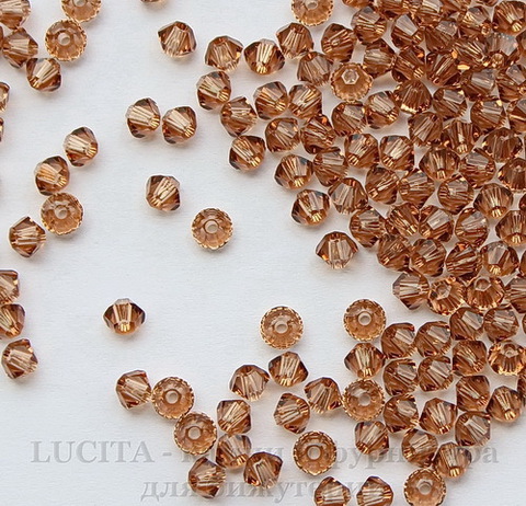5328 Бусина - биконус Сваровски Light Smoked Topaz 3 мм, 10 штук