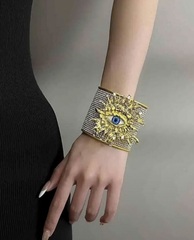 braslet-manzheta-glaz-s-kristallami-v-stile-schiaparelli