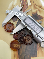 Пуговицы на прокол натуральный рог светло-коричневые (полупрозрачные)