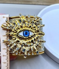 braslet-manzheta-glaz-s-kristallami-v-stile-schiaparelli