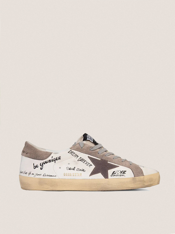 Super Star in white leather with contrasting decorative lettering