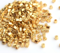 Бисер Тохо Hexagon 11/0 0557 золотой