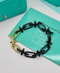 braslet-lux-iz-dvuhcvetnogo-metalla-s-shipami-v-stile-tiffani-farrell-williams