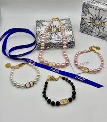 Браслет CDior из черных бусин с подвеской лого