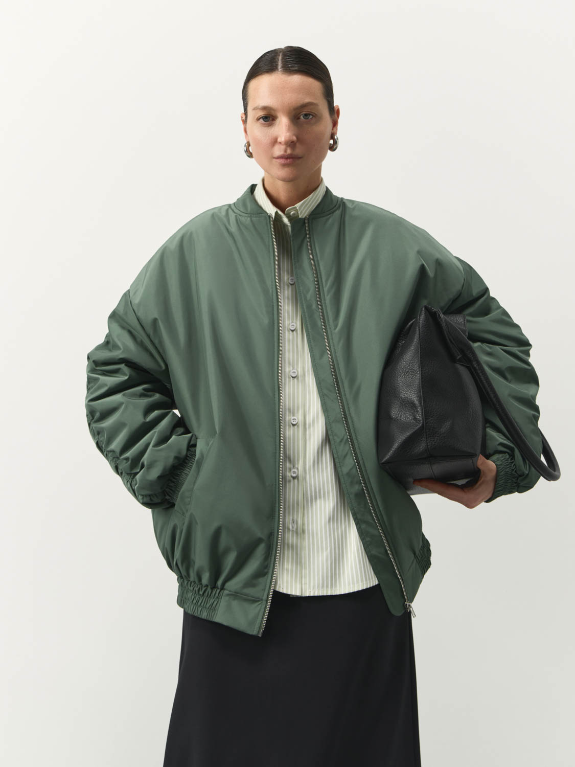 Quilted buttoned jacket Luga with a hood