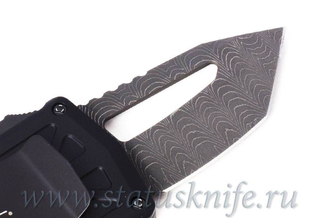 Нож Microtech Exocet 001 Tanto Damascus 158-16S Ringed HW