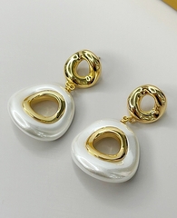 sergi-s-kruglymi-podveskami-v-stilistike-poison-drop