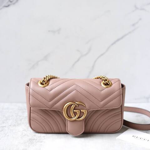 Мини-сумка на плечо Gucci GG Marmont из стеганой кожи
