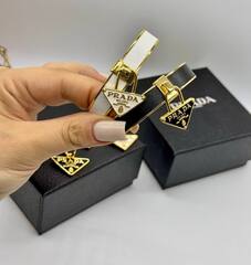 30654- Браслет жесткий PRADA кожаный с подвеской треугольник
