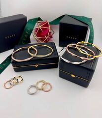 Браслет крученый жёсткий из серебра 925 пробы GRAFF