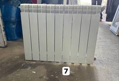Биметаллический радиатор Б/У 500 9 секц. бок.